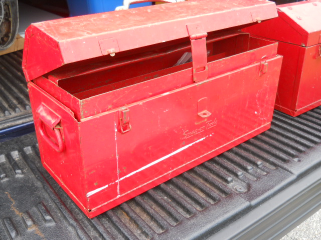 Box 2 has carry handles on the ends, a metal carry handle on top and Snap On Tools stamped in the front. KRA-21A on the back